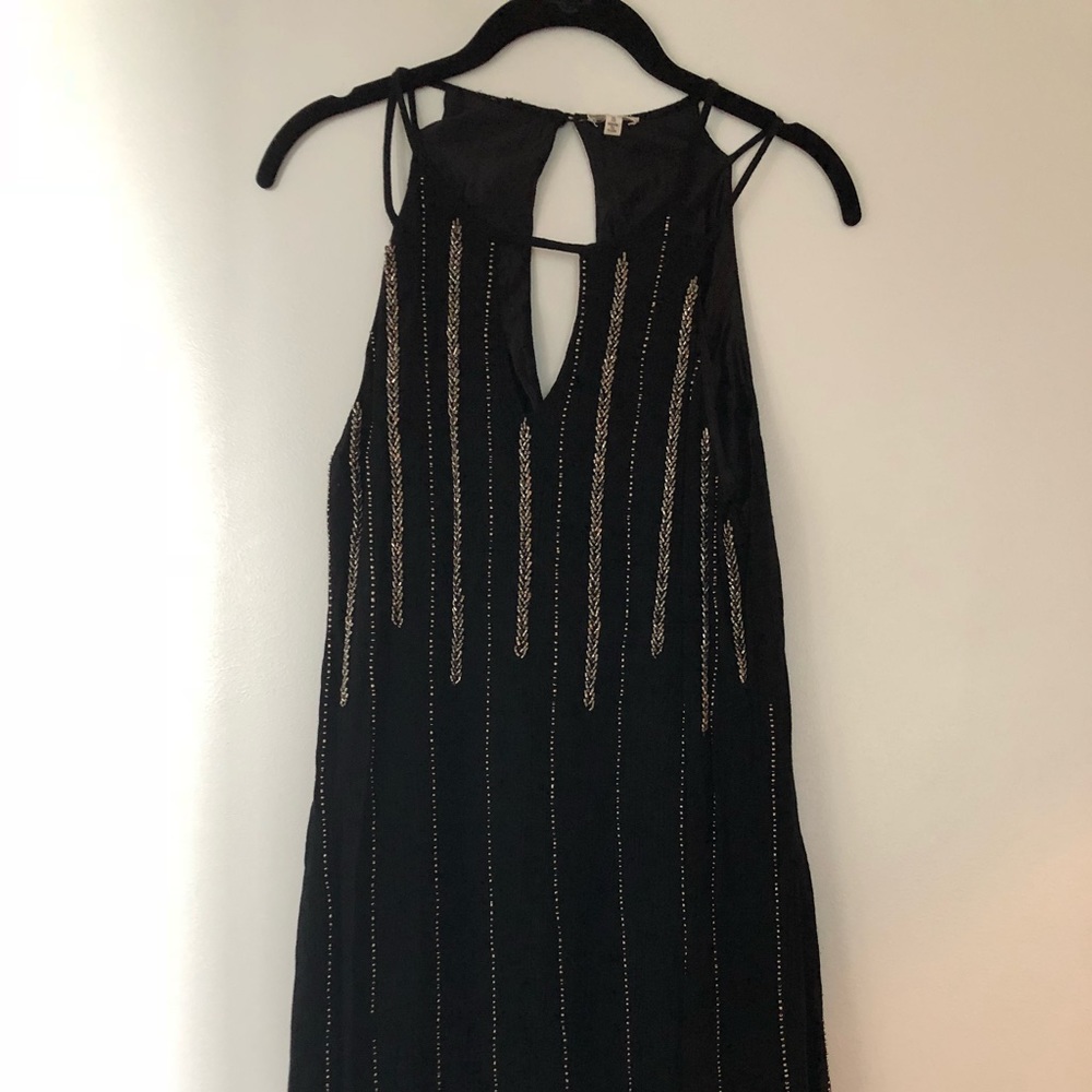 Black dress size small with beading Yellow Button